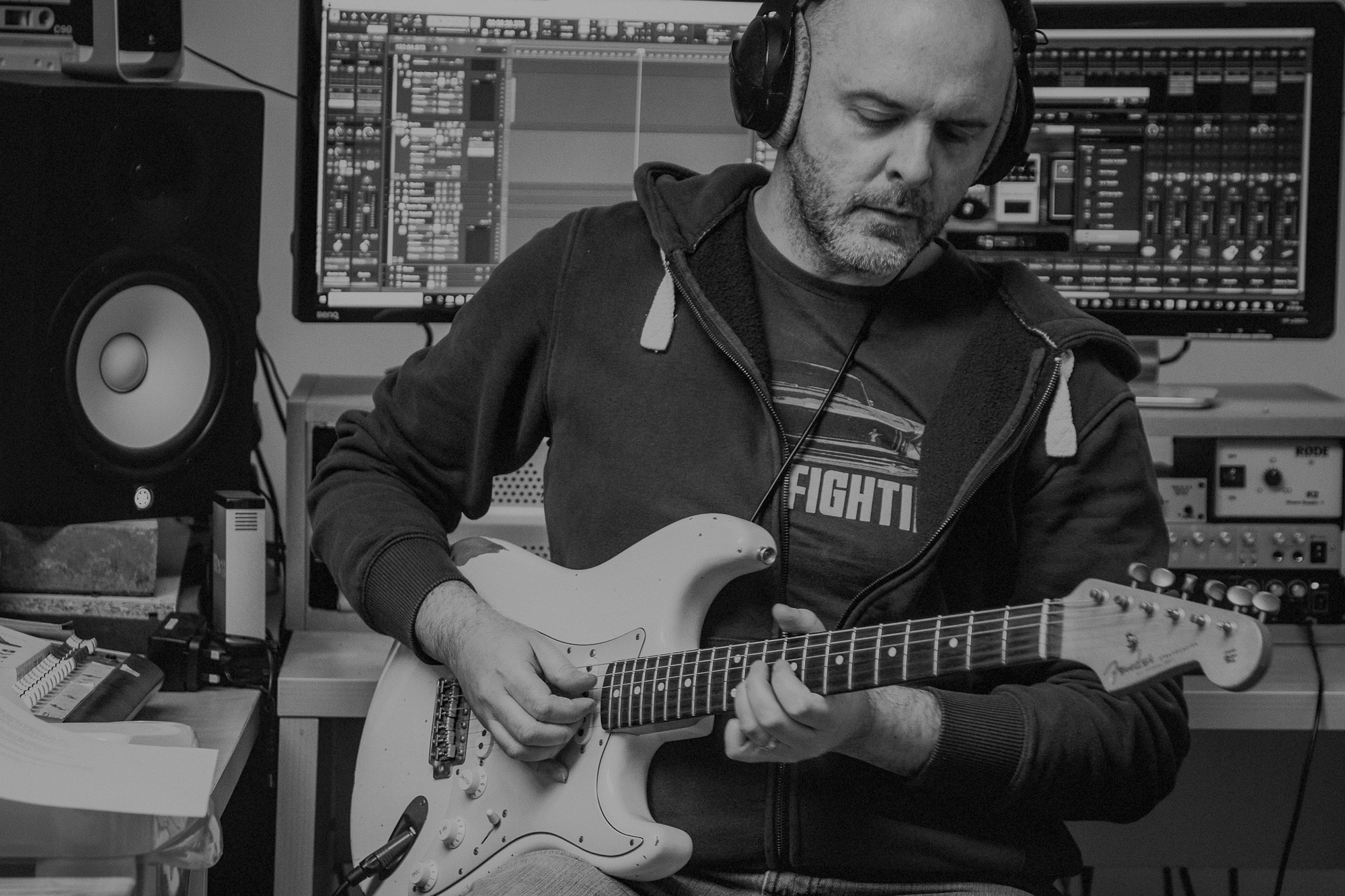 Mark Pierce playing strat in studio