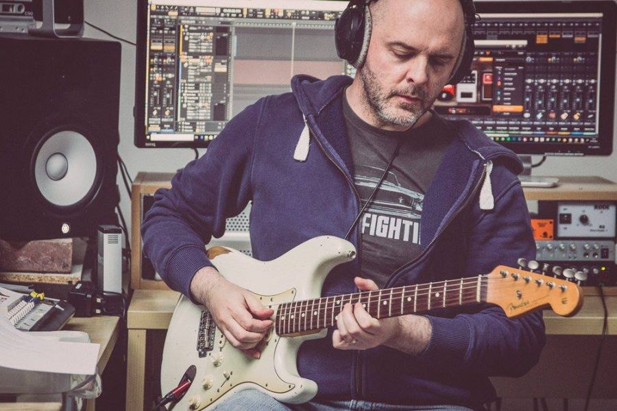 Mark Pierce playing a Fender strat