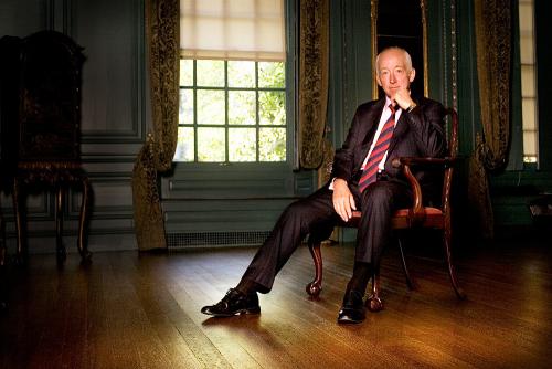 Portrait of a distinguished gentleman seated in the grand surroundings of Treasurer’s House, York